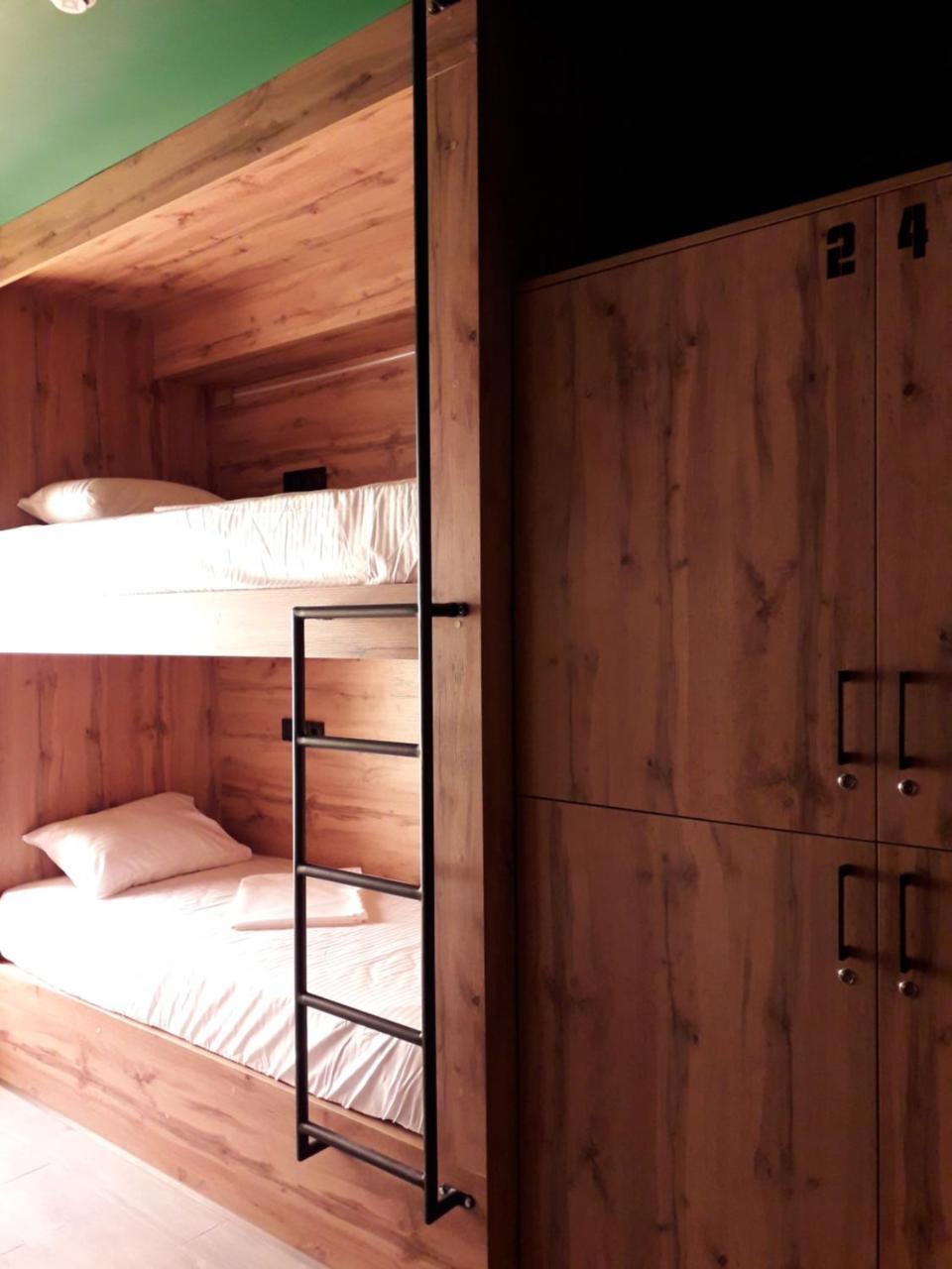 Full House Capsule Hostel Rivne Kültér fotó Bunk beds in a hostel