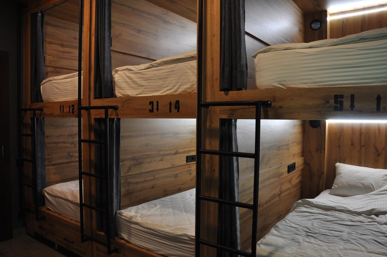 Full House Capsule Hostel Rivne Kültér fotó Beds in a capsule hotel