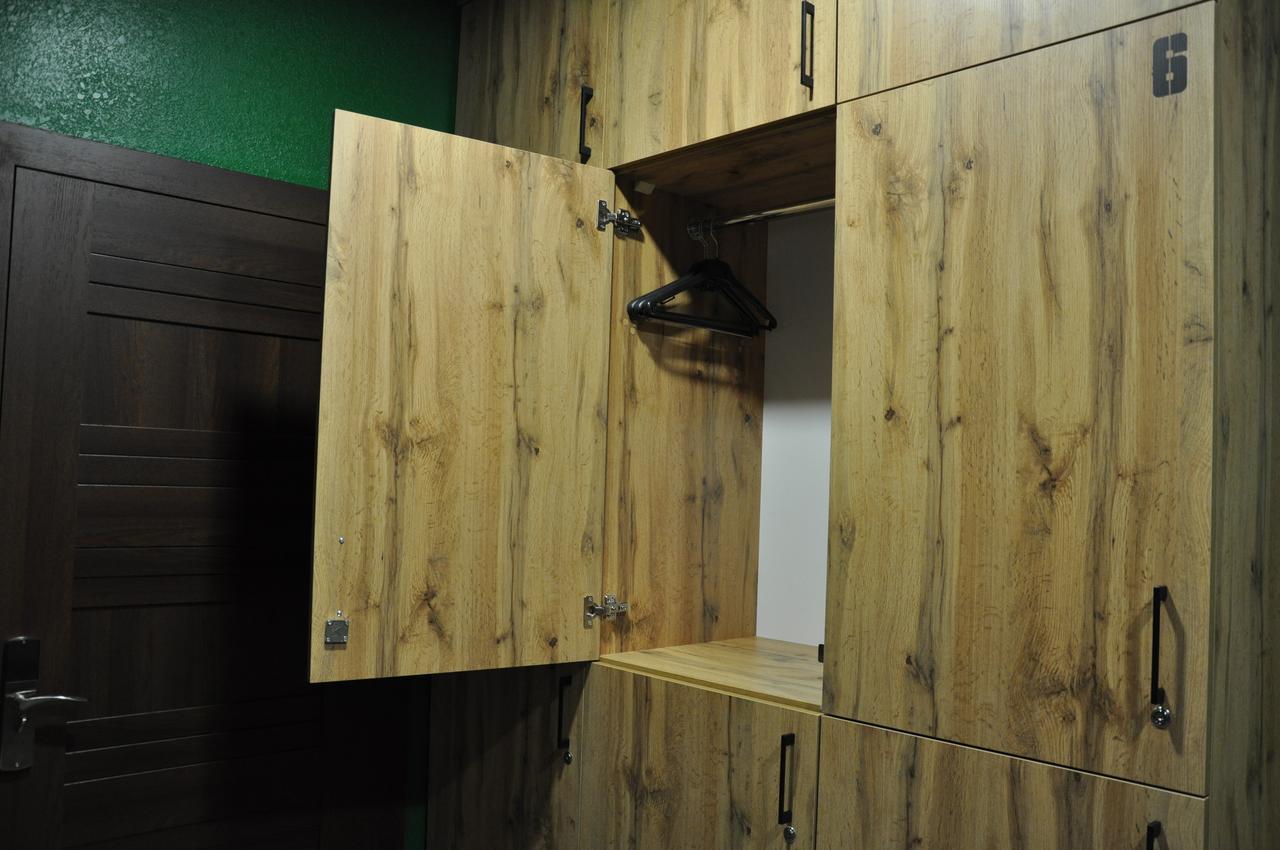 Full House Capsule Hostel Rivne Kültér fotó A wooden locker