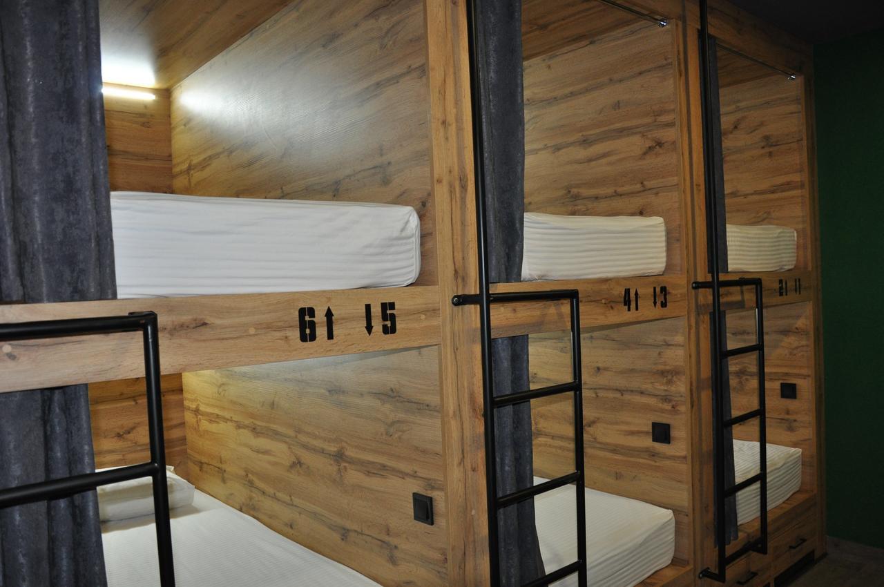 Full House Capsule Hostel Rivne Kültér fotó Bunk beds in a hostel