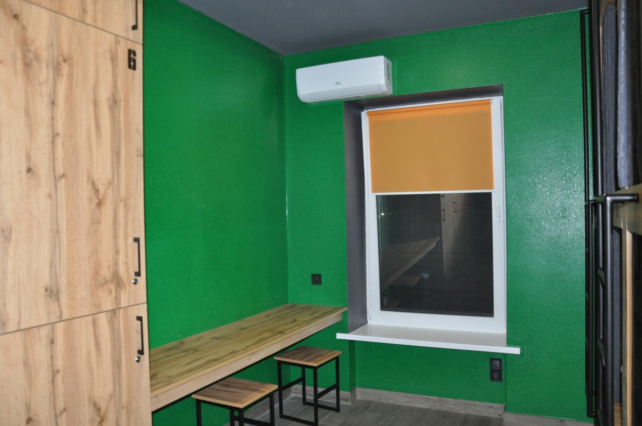 Full House Capsule Hostel Rivne Kültér fotó A window with a window screen
