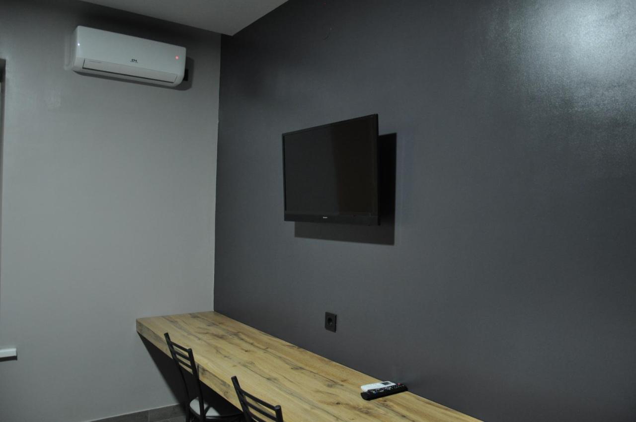Full House Capsule Hostel Rivne Kültér fotó A wall-mounted television
